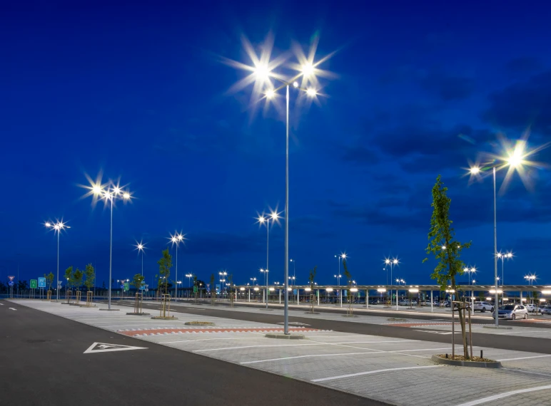 Illuminated parking area with streetlights