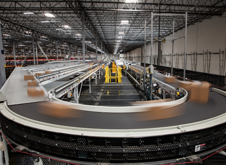 Boxes moving on conveyor belt